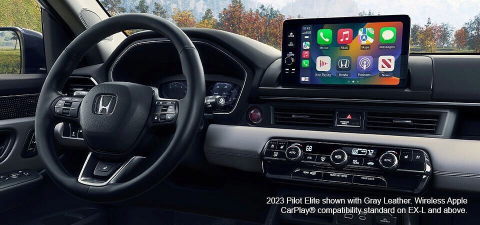 2023 Honda Pilot Elite with Gray Leather interior. Wireless Apple CarPlay compatibility standard on EX-L and above.
